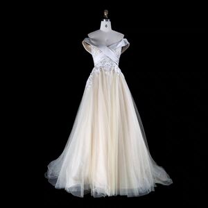Elegant Cream Off-Shoulder Gown